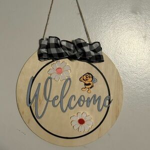 Charming Welcome Sign with Black and White Accents